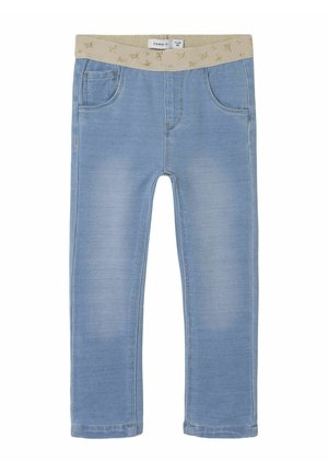 Lyseblå jeans med en glitrende beige elastisk talje, der har fem lommer og en slim fit design. Glat denim tekstur med let falming.