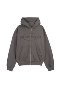 Szara bluza zapinana na zamek, wykonana z mieszanki bawełny, z dużym napisem "INFLAMMABLE" z przodu, kieszeniami typu kangur oraz ściągaczami na rękawach.