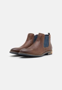 Lloyd Stivaletti - cognac