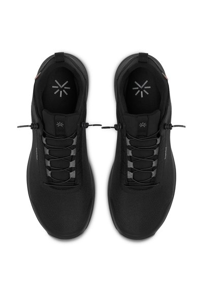 Black athletic shoes with a textured mesh upper, elastic laces, and a cushioned sole. Features a pull tab and subtle logo on the insole.