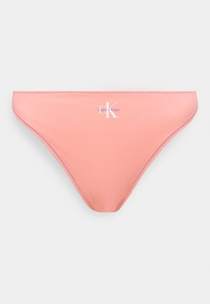Κάτω μέρος μπικίνι σε χρώμα ανοιχτό κοραλλί με μωβ ραφές και λευκό λογότυπο Calvin Klein "ck" στο κέντρο της μπροστινής μέσης.