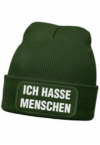 Green knit beanie with a ribbed texture and a folded cuff. Features a rectangular patch with white text reading "ICH HASSE MENSCHEN."
