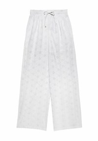 Pantaloni culotte bianchi, larghi e comodi, con vita elastica e cordoncino per la regolazione. Presentano un motivo di ricamo floreale su tutta la superficie. Tessuto morbido.