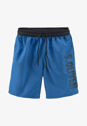 Blue swim shorts with a black elastic waistband and drawstring. Features a large black logo printed vertically on the side. Smooth texture.
