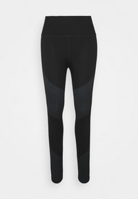 Zwarte leggings met een hoge tailleband, textuur in de zijpanelen en een gladde afwerking. Het ontwerp omvat een mix van vaste en ribbeltexturen.