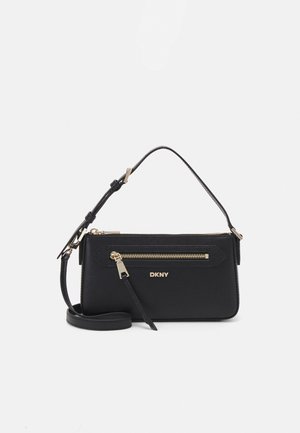 Black leather DKNY handbag featuring a gold zipper, a detachable shoulder strap, and a top handle. Smooth texture with a compact rectangular shape.