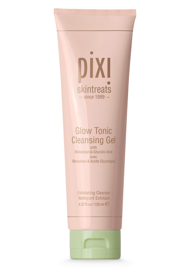 Rosa tube med grønn kork, merket "Pixi Glow Tonic Cleansing Gel." Teksturert overflate, 135 ml, inneholder detaljer om ingredienser og bruk.