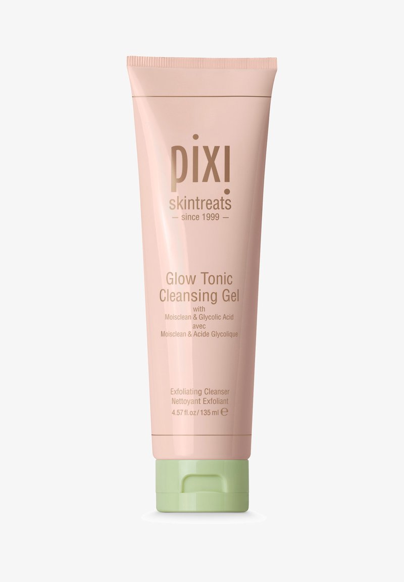 Tubetto rosa con tappo verde, etichettato "Pixi Glow Tonic Cleansing Gel." Superficie texturizzata, 135 ml, presenta dettagli sugli ingredienti e sull'uso.