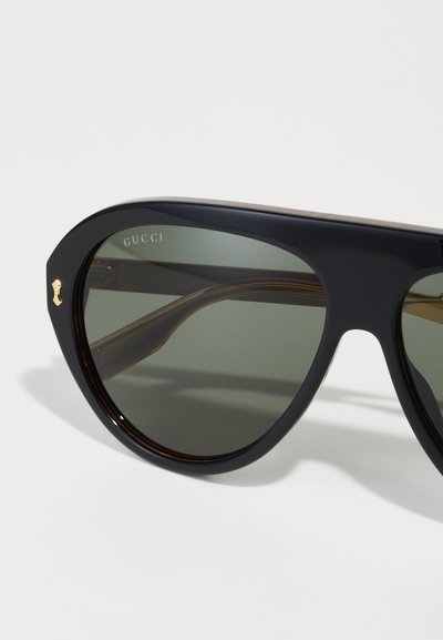 Gucci UNISEX - Óculos de sol - black/gold-coloured