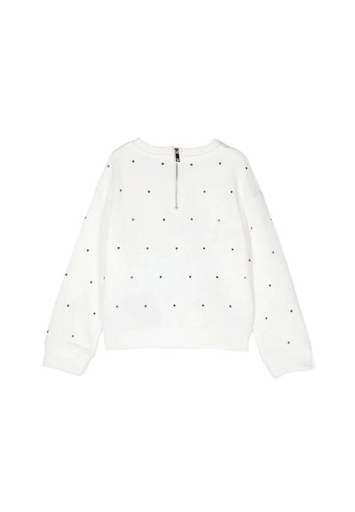 Felpa bianca con maniche lunghe, decorata con piccoli dettagli neri, dotata di chiusura a zip sul retro e polsini a coste.