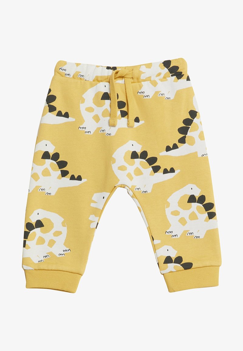 Pantalon jaune pour bébé avec des imprimés de dinosaures blancs et noirs, taille élastique et cordon à l'avant.