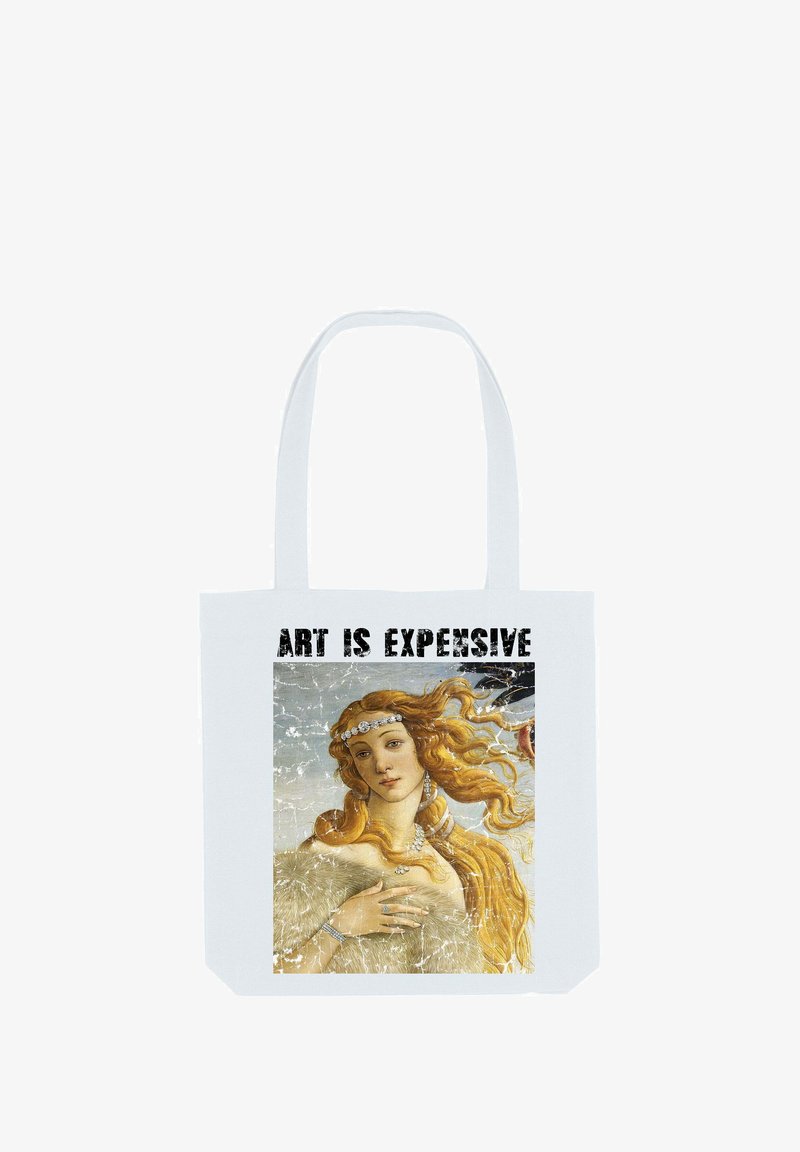 Witte canvas tote bag met een vintage kunstprint van een vrouw met vloeiende haren, omringd door de tekst "KUNST IS DUUR" in vet zwart.