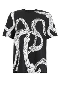 Svart bomull t-shirt med en djärv vit abstrakt design med texturerade linjer och kurvor. Korta ärmar och rundad halsringning.