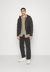 Calvin Klein MIX MEDIA QUILT JACKET HOOD - Winterjacke - black/schwarz ...