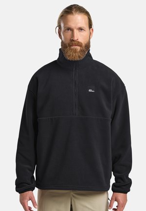 Black fleece pullover with a high collar, quarter zip, and a small logo on the chest. Features long sleeves and a relaxed fit.