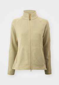 Giacca in pile di un beige chiaro con colletto alto, zip frontale e due tasche laterali. Presenta un tessuto testurizzato e cuciture a contrasto.