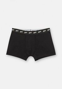 Boxeri scurți negri din bumbac cu un tiv cu logo. Prezintă un compartiment anterior și o potrivire strânsă, cu detalii minime de cusătură. Textură netedă.