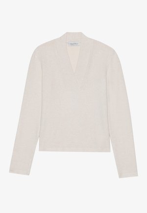 Hämy beige pitkähiha pullover, jossa on V-kaula-aukko, valmistettu pehmeästä neulotusta materiaalista. Yksinkertainen muotoilu, jossa on hieman lyhennetty leikkaus ja ei näkyviä kuvioita.