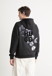 HUGO Sweat à capuche - black