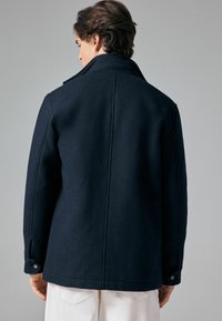 Next Jas - navy blue texture