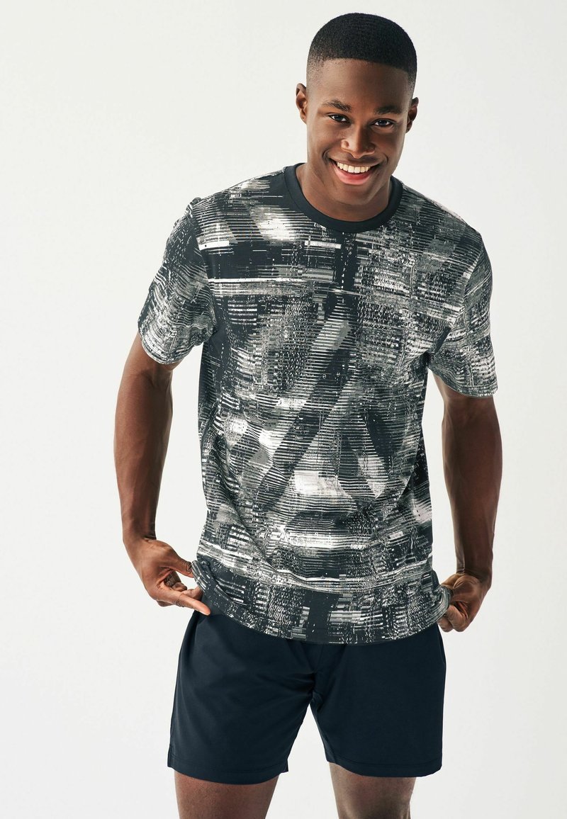 Next ACTIVE TIE DYE - Nyomott mintás póló - black white