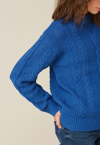 Next Sweter