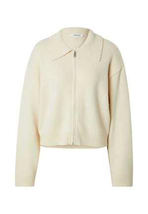 Crèmekleurige korte cardigan van zachte stof, met een ronde kraag, volledige ritssluiting en geribbelde zomen.