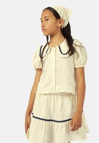 MIPOUNET Falda acampanada - ecru navy