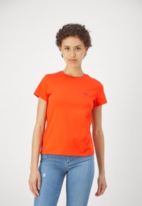 Levi's® Tričko s potlačou - orange