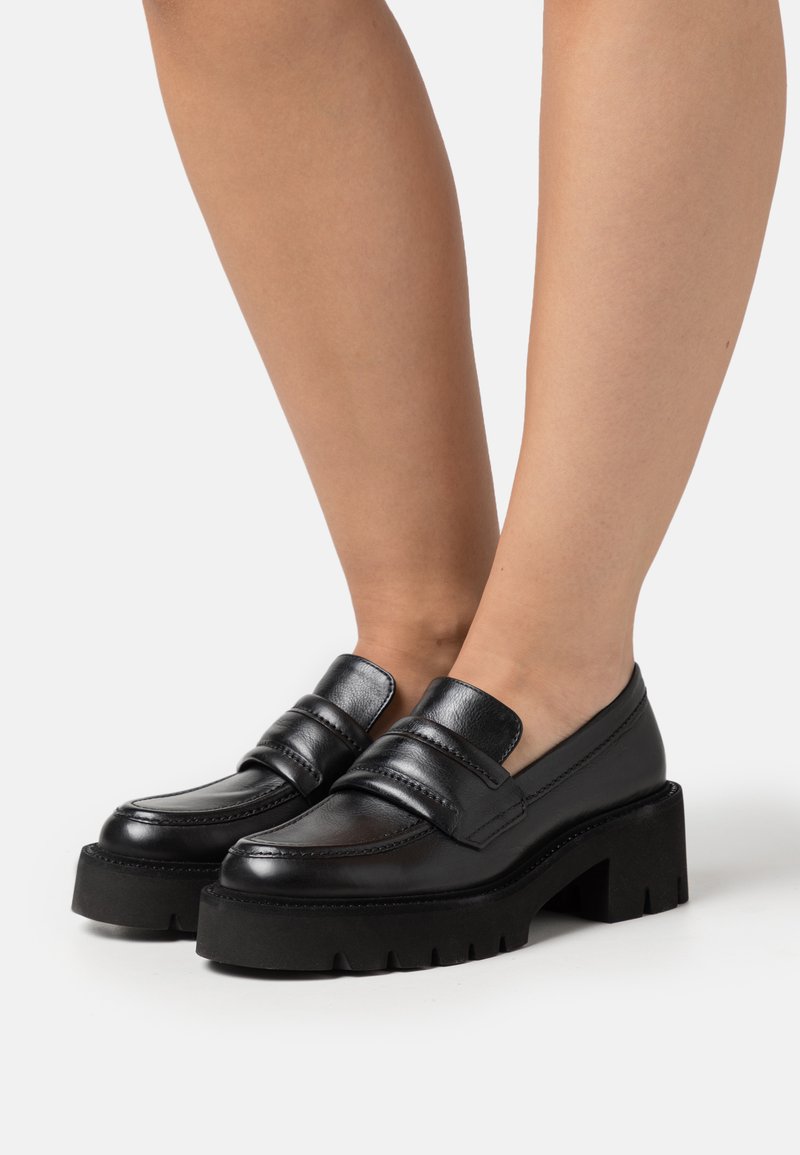 kennel schmenger high heels