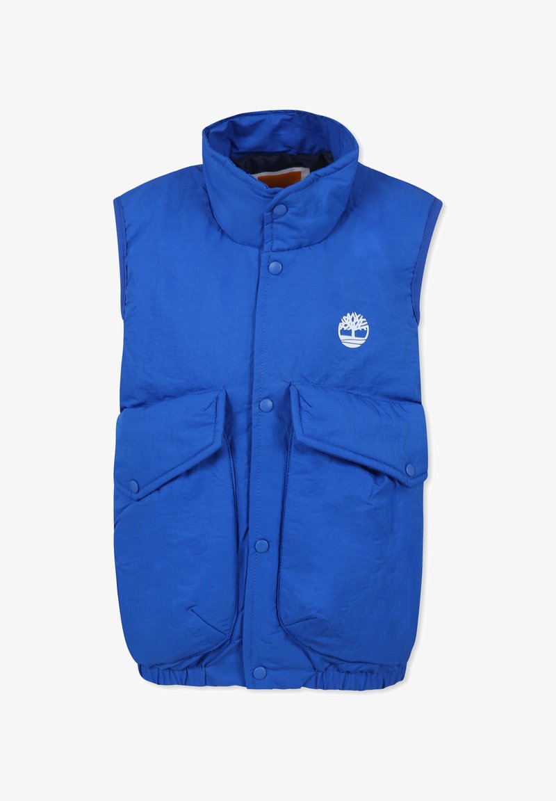 Blauwe geïsoleerde vest met een hoge kraag, drukknoopsluiting en twee grote voorzakken. Kenmerkt zich door een logo op het linkerbovenste gedeelte.