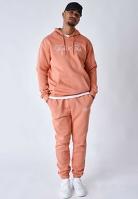 Project X Paris Pantalones deportivos - orange cuivre