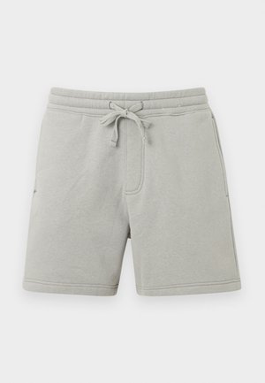 Light gray cotton shorts with elastic waistband, drawstring tie, side pockets, and knee-length cut.