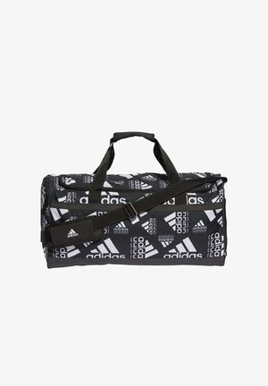 Borsa da viaggio Adidas in bianco e nero con diversi loghi, dotata di doppi manici e tracolla regolabile con una sezione imbottita.