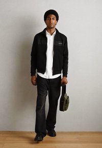 Antony Morato REGULAR FIT IN INTERLOCK BLEND WITH EFFECT LOGO PRINT - Sweater met rits - black