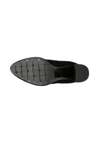 Zwarte suède schoenzool met een spitse neus, textuur van rubber voor grip en een subtiel geperst logo op de binnenzool.