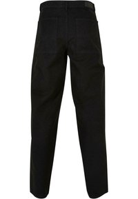 Pantaloni din bumbac negri, cu un croi drept, care dispun de două buzunare la spate, cusături minime și un eticheta pe talie. Textură netedă și culoare uniformă.