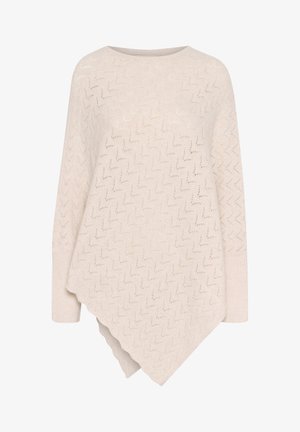 Heledbeez ponšo, millel on sakiline muster, valmistatud pehmest kudumikoest. Omab paadi kaela ning asümmeetrilist äärest koos ribakudumiste mansettidega.