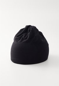Black fabric beanie with a gathered top, soft texture, and seamless design. Rounded shape with a smooth, uniform appearance.