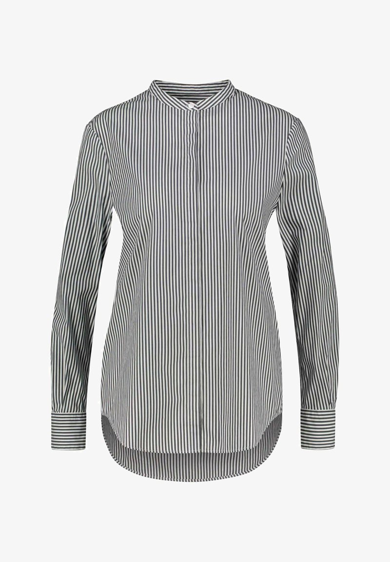 Chemise à manches longues rayée verticalement noire et blanche, boutonnée, col mandarin et ourlet arrondi.