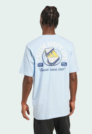 Light blue cotton t-shirt with a graphic of a cheese grater and text "CHEESE STRIPE LIFE" in yellow and blue on the back. Short sleeves.
