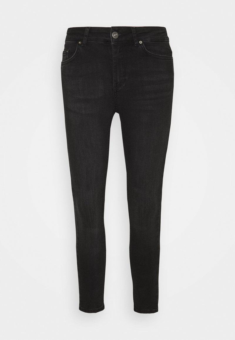 Jeans ajustados negros hechos de mezclilla, con cierre de botón, diseño de cinco bolsillos y detalles cosidos para un ajuste ceñido.