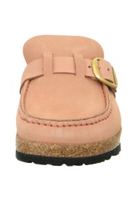 Pink suede slip-on shoe with a rounded toe, stitched detailing, and a gold buckle accent. Cork sole with textured black rubber grip.