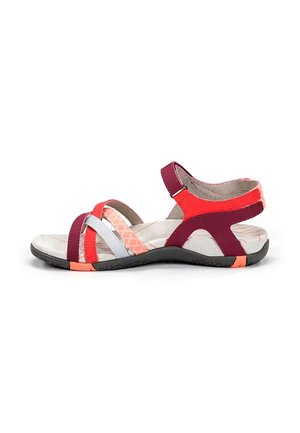 Sandalia de mujer con puntera abierta con tiras multicolor en rojo, rosa y blanco, suela acolchada y correa ajustable en el tobillo con cierre de velcro.