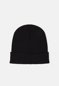 Black knitted beanie hat with a ribbed fold-over cuff, smooth texture, and rounded top. Simple design, no patterns or accents.