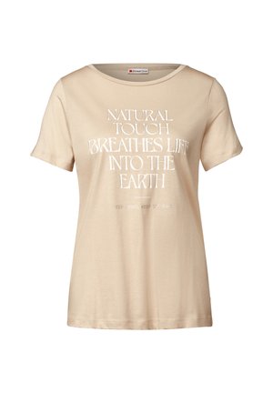 Beige bomuld t-shirt med korte ærmer, rund halsudskæring og hvid tekst: "NATURLIGT TOUCH GIVER LIV TIL JORDEN" centreret på forsiden.