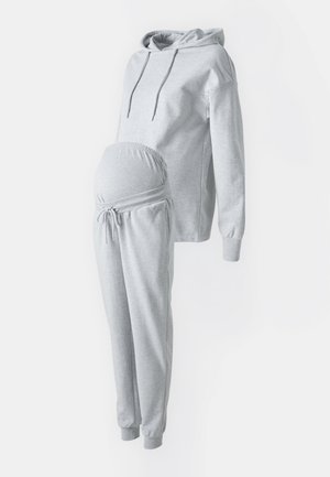 Grey maternity hoodie and joggers set, featuring soft cotton blend, elastic waistband, drawstring detail, and relaxed fit for comfort.