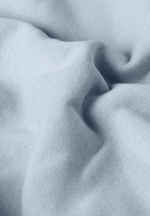 Light blue soft fabric with fine knit texture, shown in gentle folds and creases.