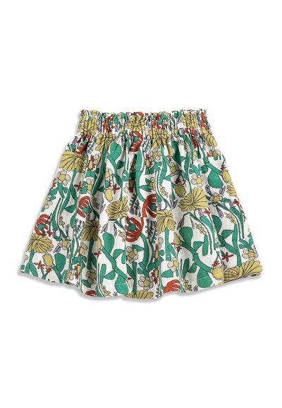 Jupe blanche avec taille élastique froncée, présentant un motif floral coloré aux tons verts, jaunes, rouges et oranges.