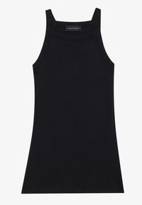 Camiseta sin mangas negra con tirantes finos, textura acanalada y silueta ajustada. Etiqueta de la marca "ANNA FIELD" visible en el escote.